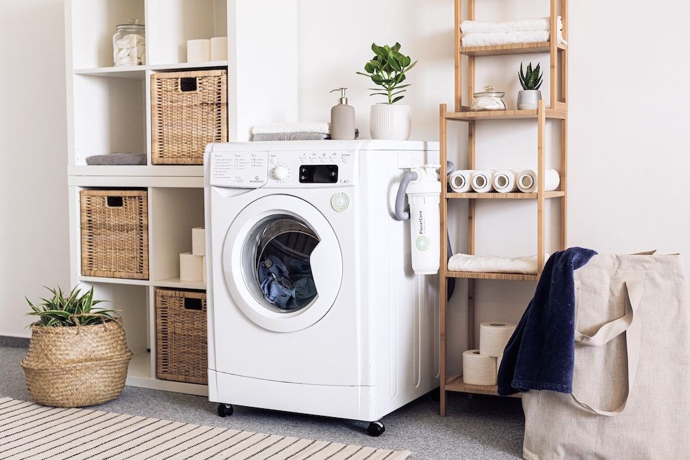 A modern washing machine in a home.